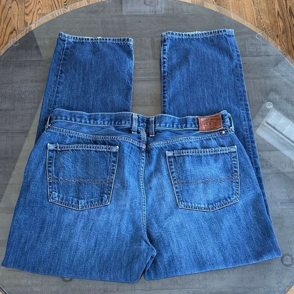 Lucky Brand Men's 363 Vintage Straight Jeans. Size 40 x 32. Distressed back hem